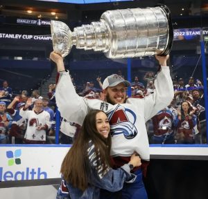 Logan OConnor with CSH Graduate, Kendra Lanuza after winning the Stanley Cup